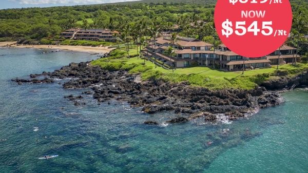 The image features a coastal resort surrounded by water, with a promotional price reduction highlighted in red.
