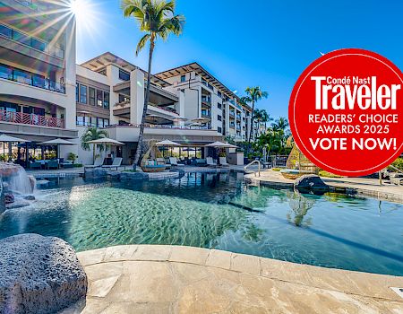 A luxurious resort pool with palm trees is shown. A red circle promotes Cond&eacute; Nast Traveler's 2025 Readers' Choice Awards, urging a vote.