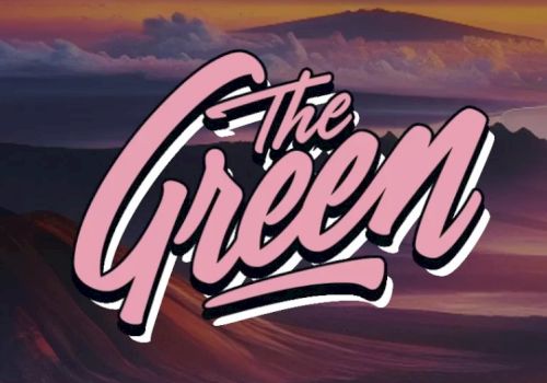 The image features stylized text "The Green" in pink, set against a mountainous landscape with a sunset background.