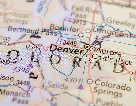 It's a map section showing Colorado, highlighting cities like Denver, Aurora, Boulder, and others, with some elevation details.