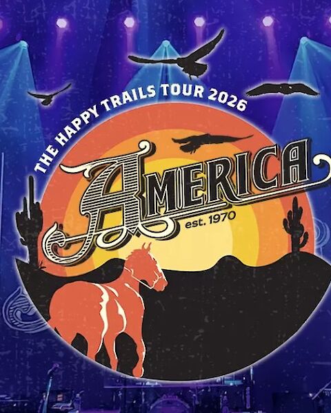 A concert stage backdrop featuring &ldquo;Americh&rdquo; (The Happy Trails Tour 2026) with a desert sunset, horses, cactus, and birds silhouette.