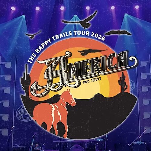 A concert stage backdrop featuring “Americh” (The Happy Trails Tour 2026) with a desert sunset, horses, cactus, and birds silhouette.